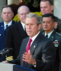 President Bush speaks to reporters about the growing crisis with North Korea, vowing to overthrow Saddam Hussein.